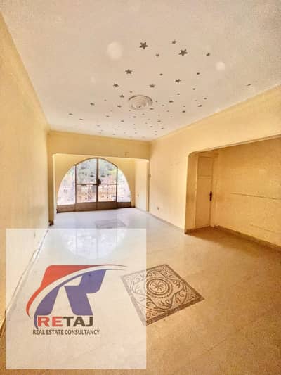 Apartment for rent at a bargain price near Al-Manhal and Al-Tawhid Wal-Nour schools on Mustafa Al-Nahhas Street.