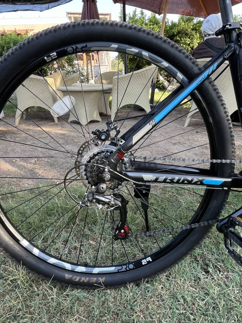 Trinx m136 pro 4