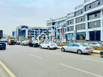 صيدلية للإيجار – موقع استراتيجي في الشيخ زايد واجهة مباشرة على شارع البستان الرئيسي _ الشيخ زايد