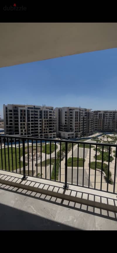 Apartment for rent in Zed West Towers compound in Sheikh Zayed with kitchen and air conditioning.
