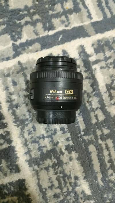 Nikon 35 1.8  وسوفت بوكس اوتو