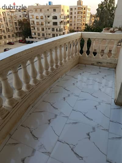 Apartment for rent in Zahra Al-Maadi, Madinat Al-Miraj, front view, area 165m, consisting of 3 rooms - bathroom - reception - kitchen, floor 3, there is an elevator, super lux finishing