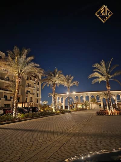 Ground floor apartment with garden for sale in a compound in the heart of Sheikh Zayed, in installments over 7 years