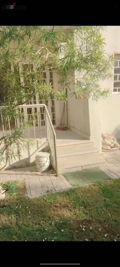 For sale, an apartment of 134 square meters on the ground floor, fully secured with iron + a 100 square meter garden in the compound The Address, 12th district, in the middle of Sheikh Zayed