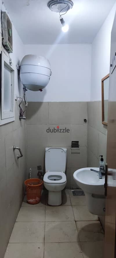 Store for rent in the best location in Dokki, close to Masdaq Street, 60 meters, 45,000 required