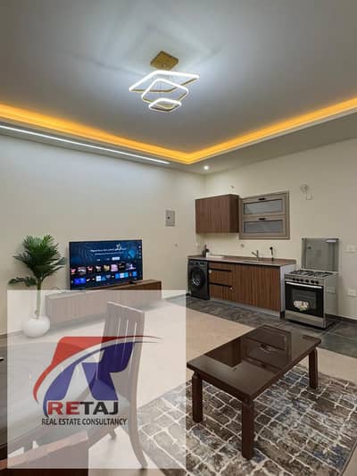 Furnished hotel apartment with ultra-super-luxurious finishing for rent in Al Banafseg Villas, First Settlement