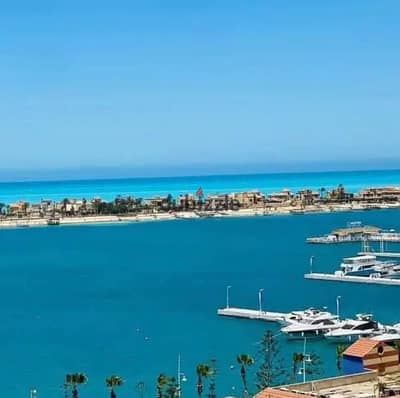 Receive a luxurious 150m² chalet with double sea and lagoon views in a prime location on the North Coast, New Alamein Marina, Marina 8