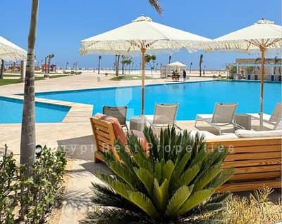 Own a fully finished chalet with a private garden in Seashore Ras El Hekma, one of the best villages on the North Coast chalet for sale in Hyde ParK
