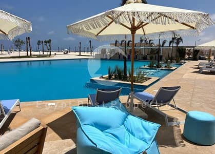 Own a 3-bedroom chalet with a private garden in Seashore Ras El Hekma, fully finished, in one of the best villages on the North Coast. Chalet for sale