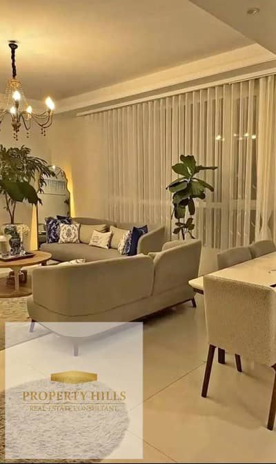 Receive a duplex in front of Madinaty at the price of an apartment after cash discount - complete finishing - panoramic view - New Heliopolis