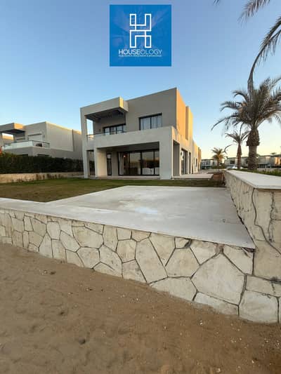 Standalone villa finished with air conditioning and kitchen Sea view for sale in Azha Coast Ras Al-Hikma at the best price in the market Azha North
