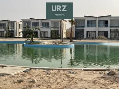 تقسيط 10 سنين شالية كورنر sea& lagoon view متشطبة بالتكيفات في افضل مرحلة للبيع في الساحل الشمالي في راس الحكمة بالقرب من هاسيندا و تلال ومراسي