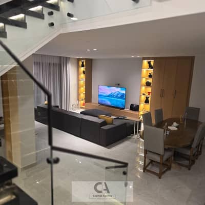 Villa for rent in Sodic Villette, fully furnished and finished townhouse with furniture from the USA, featuring a stunning view and private garden | V