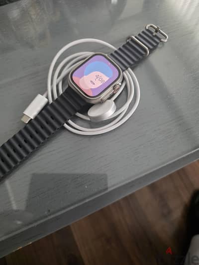 Perfect condition with original strap and original charger