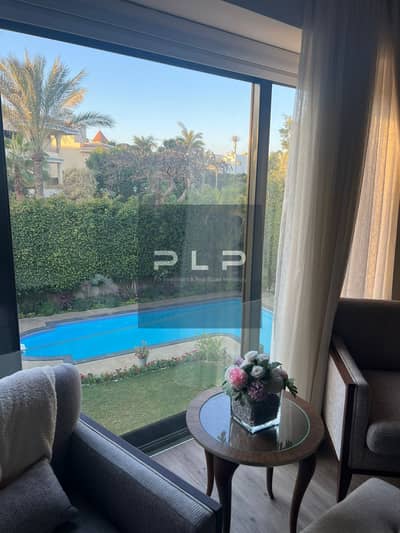 Standalone villa available for immediate handover, featuring high-end finishing, a swimming pool, and an elevator, located in the Golden Heights compo