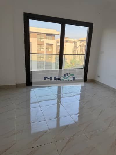 For rent in Madinaty, a 131 sqm apartment in B15, first occupancy, 3 bedrooms + 2 bathrooms, 4th floor, park view, opposite services, opposite Mahmoud