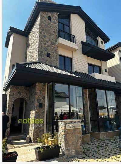 Lowest price townhouse, double view, immediate delivery and in a prime location The MarQ Compound Lowest price townhouse, double view, immediate delivery and in a prime location The MarQ Compound
