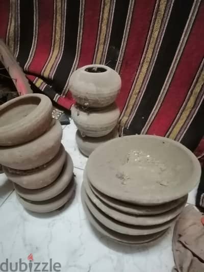 اطباق أكل ومساقي للحمام