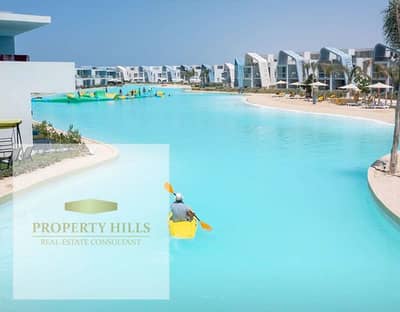أفخم شاليه  فندقي Fouka Bay – Direct Lagoon View متشطب بالكامل و بالتقسيط علي 9 سنين بأقل مقدم في الساحل الشمالي - فوكا باي