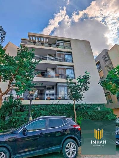 Apartment for sale with a 12-year installment plan and a 1.5% down payment in the "Origami Golf" phase of the Taj City compound—developed by Madinet M