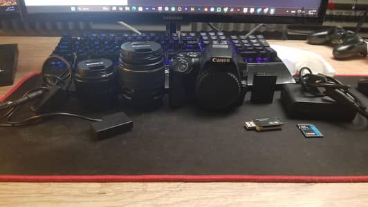 canon 250D مع عدستين وبطارية اصلية/بطارية وهمية