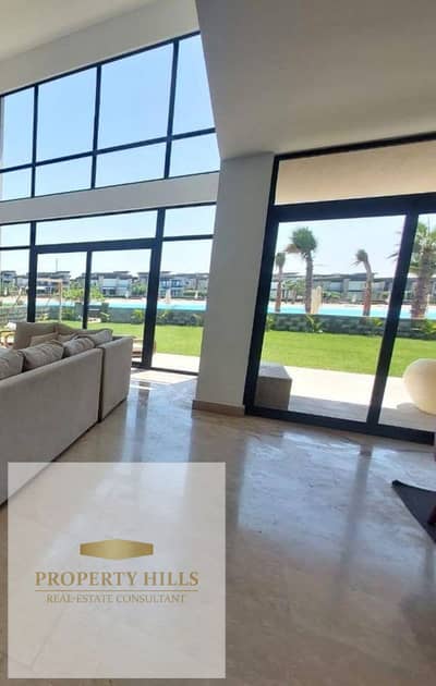Only 5% down payment for a villa for sale with complete finishing, panoramic sea view, direct beach in Sult - Ras el Hikma - North Coast