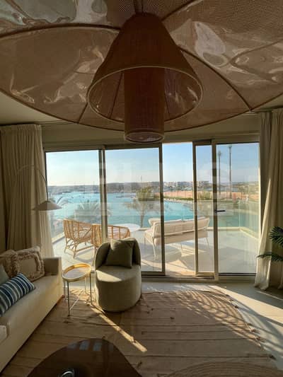 Double view sea and lagoon chalet for rent Marina front