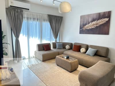 Apartment for rent in Madinaty Compound, New Cairo for immediate housing, area 100 consisting of 2 bedrooms + 2 bathrooms with a direct view of the green spaces Garden view