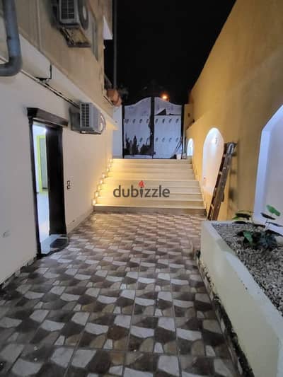 Basement unit with a private garden for sale in a prime location in Sheikh Zayed. Located in the 10th District (Neighborhood 2) on a main street, next to Al-Jawhara Mall and close to all amenities. The unit features a 170m² basement and a 150m² garden, wi