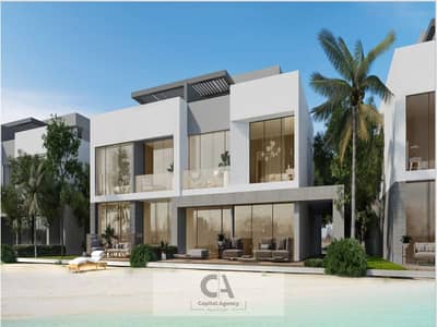 Two bedroom chalet for sale, first row overlooking the lagoon in Ras El Hekma, Azha Compound. Fully finished with air conditioning and kitchen. | Cash