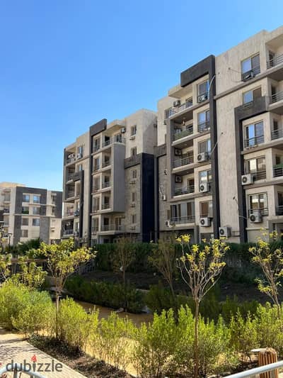 شقة للبيع في كمبوند جنة أكتوبر | 130 متر | نموذج B | دور متكرر | فيو حمام السباحة | خالصة الأقساط | من المالك مباشرة Jannat October Compound