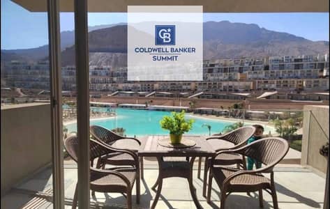 For sale A distinctive chalet with a double sea view, hotel-style finishing, and air conditioning, located in Monte Galala, Ain Sokhna