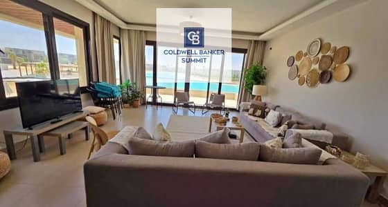 Own a seaside chalet with hotel services and ultra-luxury finishing, with immediate delivery in Azha, Ain Sokhna, and installment plans available up t