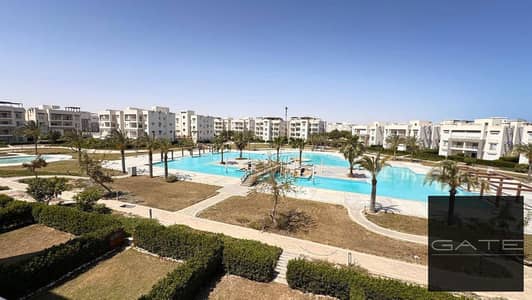 For sale, a two-bedroom chalet in Amwag, Sidi Abdel Rahman, North Coast | Ready for delivery, fully furnished, never used