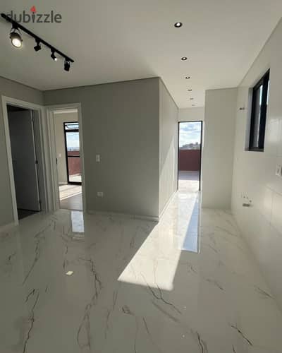 Fully finished apartment for sale directly on the main Teseen Street, specifically at Plot No. 1