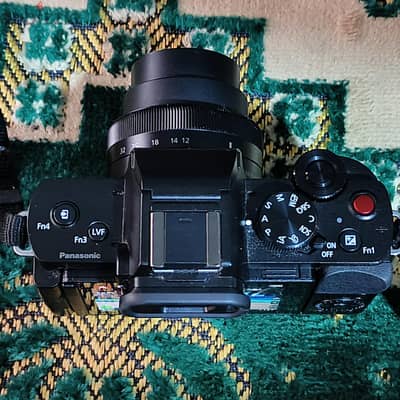 كاميرا احترافيهPanasonic LUMIX G100 20m 4k Mirrorless lumix 12-32mm