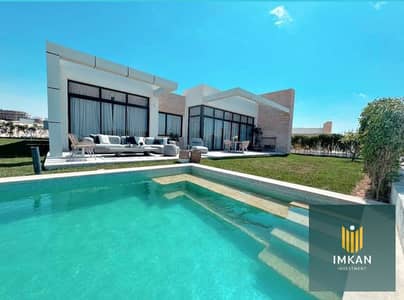 Ready-to-move, fully finished villa for sale with a 10-year installment plan at Naia Bay, Ras El Hekma (North Coast).