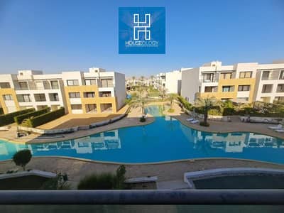 Furnished chalet with lagoon view, ready for immediate occupancy, for sale in Azha Ain Sokhna at a price lower than the company's price.