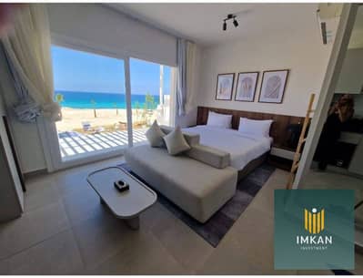 An exceptional townhouse for sale at Ras El Hekma, North Coast, in the Naia Bay resort. This fully finished, ready-to-move-in unit features a sea view