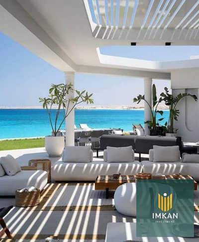 An exceptional townhouse for sale at Ras El Hekma, North Coast, in the Naia Bay resort. This fully finished, ready-to-move-in unit features a sea view