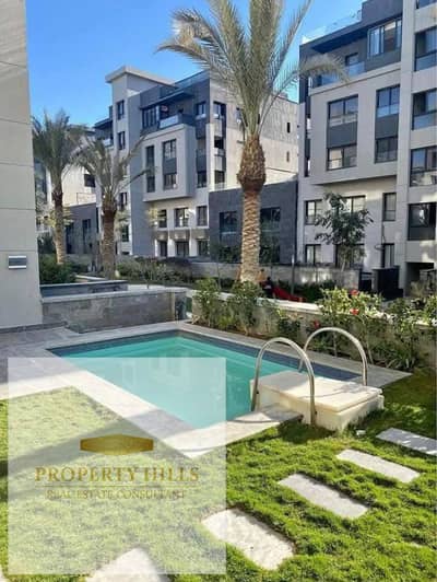 Receive an apartment with a garden at a 40% discount for cash in Trio Gardens, fully finished in a compound already inhabited - Fifth Settlement