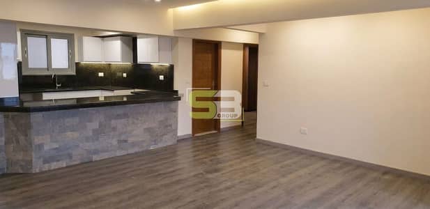 Ground floor apartment with a garden, fully finished with installment plans for one year in Al Khamael Compound