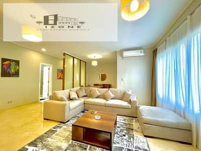 شقة بحديقة خاصة للإيجار في The Village Gate القاهرة الجديدة 140م 2 غرفة نوم 2 حمام مفروشة بالكامل