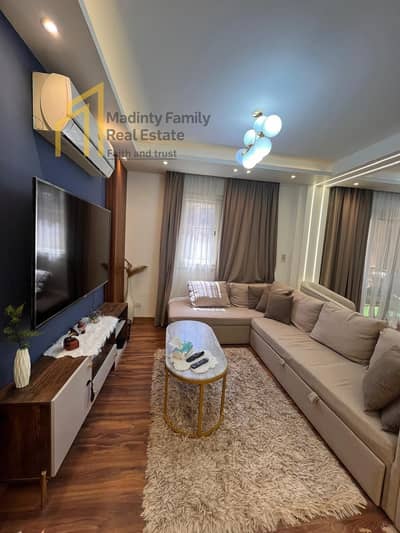For sale, a 103 m apartment with a garden view, ultra-super luxury finishing, fully completed with all facilities, in a very distinguished location.