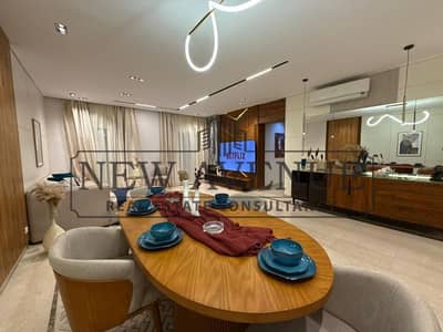 شقة ارضي متشطبة بفرش فاخر و الاجهزة بفيو علي حمام السباحة في ميفيدا في مرحلة بوليفارد Mivida phase boulevard