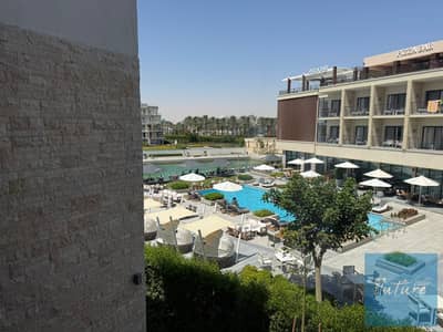 ستوديو للايجار في مارينا مراسي مطل علي حمام السباحة و الفندق و القنال بحرى صريح في مارينا مراسي الساحل الشمالي marina marassi northcoast