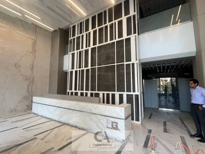 عياده للايجار 70م في ميفيدا The Place و قريب من EDNC - بدون تشطيب - التجمع الخامس