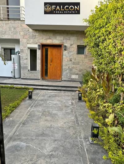 Villa with a garden in the Fifth Settlement, featuring a prime location near the American University and an excellent internal layout.