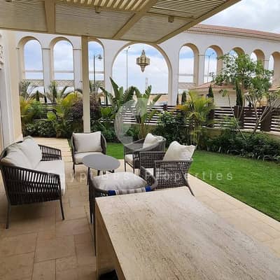 Ground floor apartment with garden for sale in village west Dorra Development in Zayed fully finished with ACs Installment plan up to 7 years