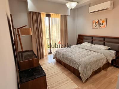 For rent in Village West Compound, Sheikh Zayed: a fully furnished apartment, complete with high-quality furnishings, finishes, air conditioning, and